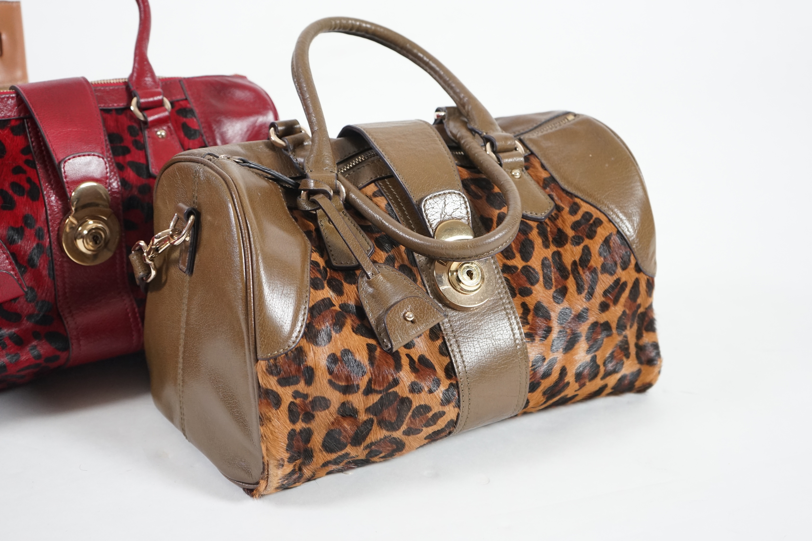Two Maria Carla handbags and a Piertucci light tan canvas and leather bag. Proceeds to Happy Paws Puppy Rescue